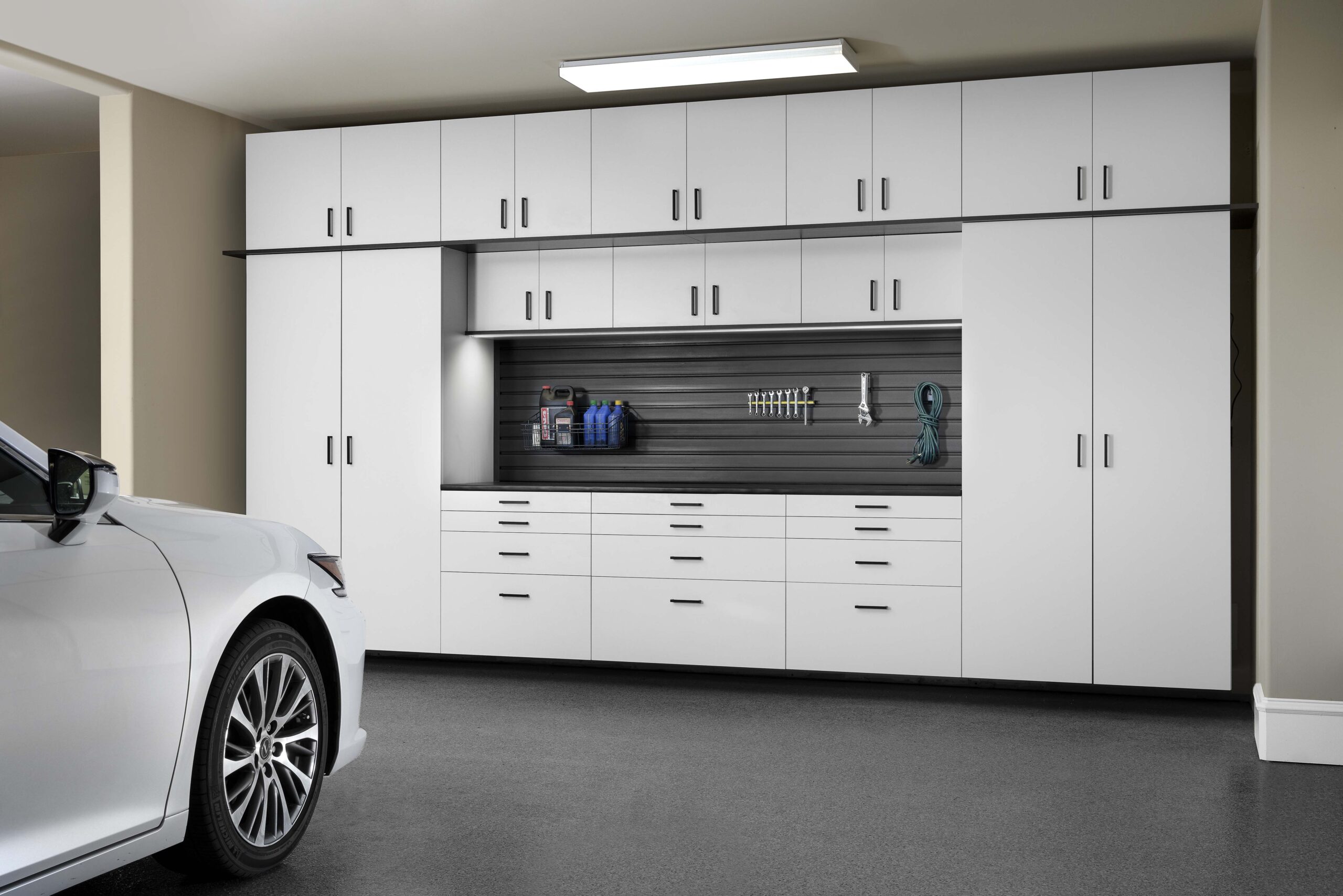 white cabinets with ebony star workbench garage solutions
