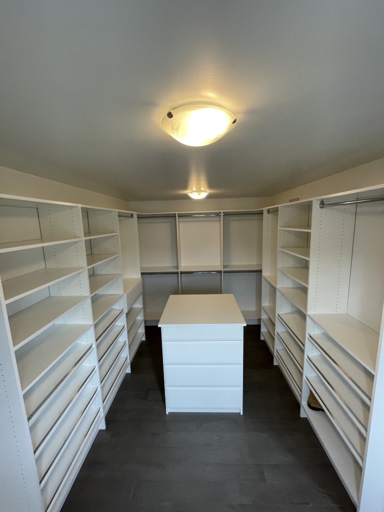 clean all white walk-in closet in ottawa